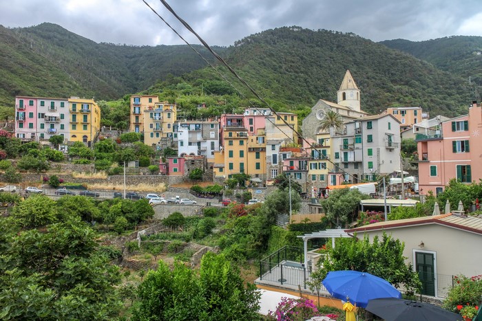 Colorful houses on a hillside in Corniglia, Italy