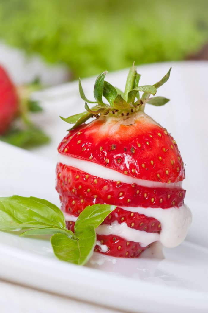 Strawberry with cream and basil