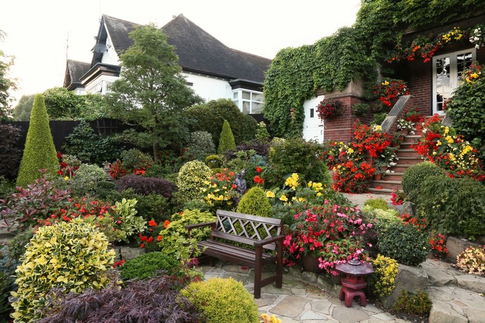 Garden with bench and flowers in Walsall, England
