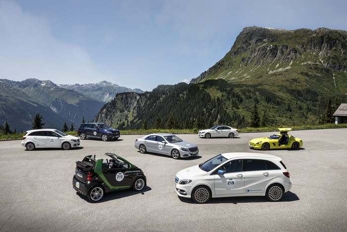 Mercedes-Benz and Smart cars on a mountain road