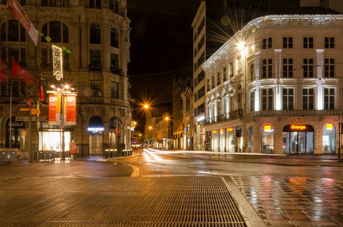 Antwerpen, Belgium street at night with Orange store