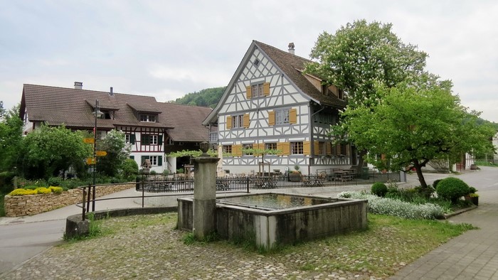 Traditional houses and fountain in Kaiserstuhl, Switzerland