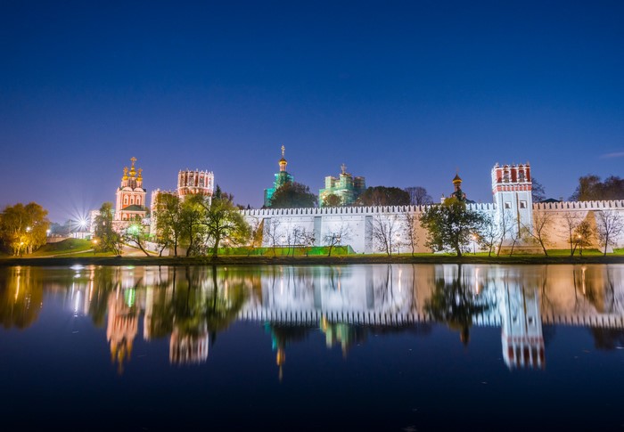 Novodevichy Convent reflected in water at dusk