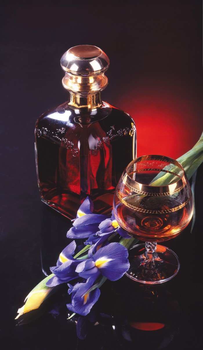 Still-life of Irises, Whisky Bottle, and Glass