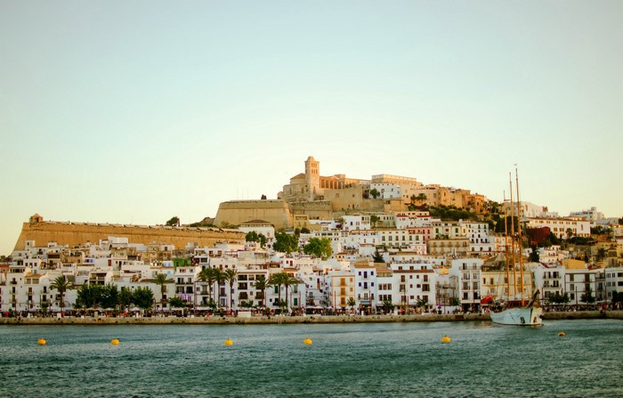 Ibiza, Spain: White Houses and a Sailboat in the Sea