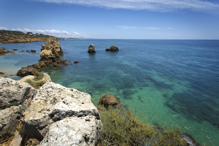 Rocky coast and clear blue sea in Portugal
