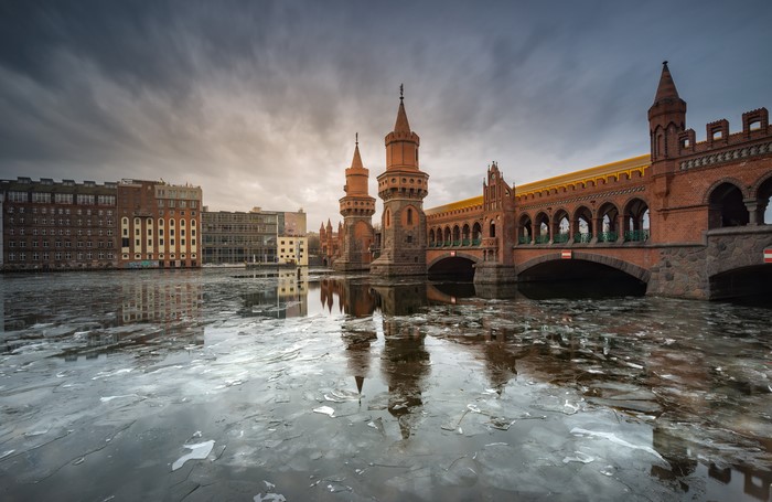 Oberbaum Bridge in Berlin, Germany with Ice on River