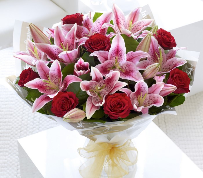 Pink lilies and red roses bouquet