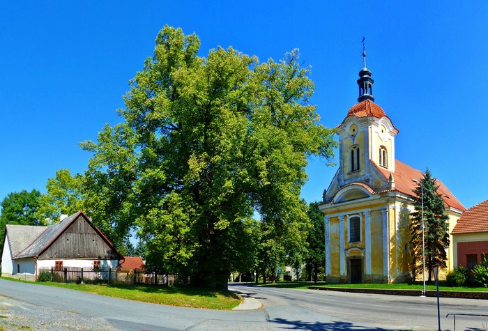 Church and old house in Czech Republic