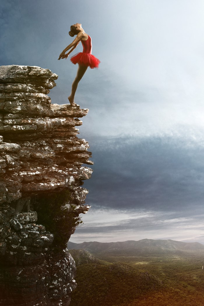 Ballerina on a cliff edge