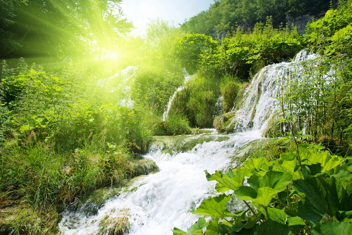 4K Waterfalls with Rays of Light