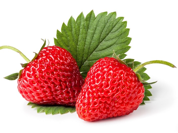 Two Strawberries with Leaf on White Background