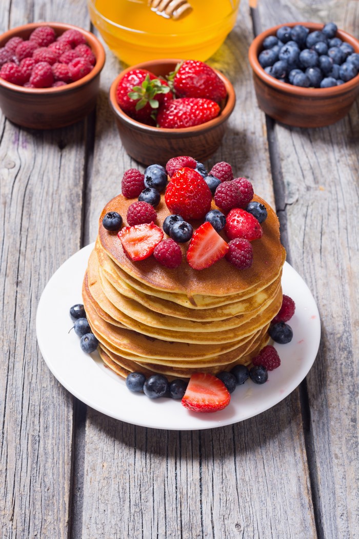 Pancakes with Strawberries, Raspberries, and Blueberries on a Plate
