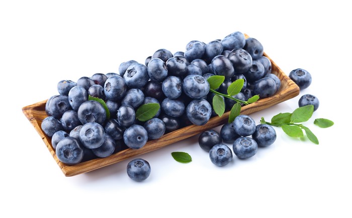 Blueberries in a wooden bowl