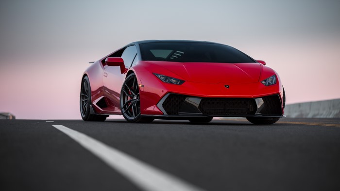 Red Lamborghini Novara VAG Huracan on Road