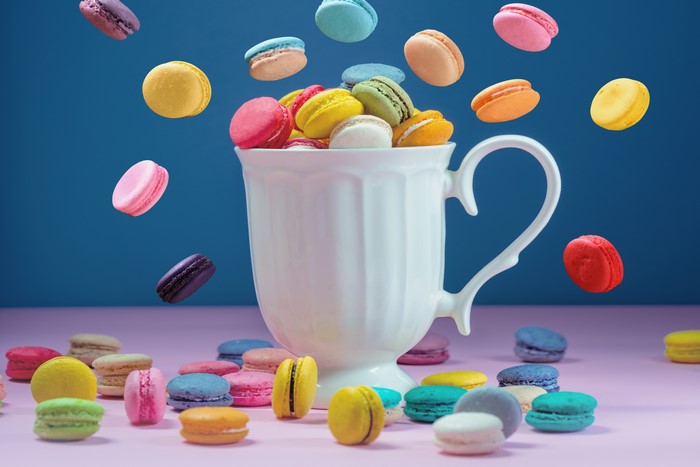 4K Macarons Falling into a Mug