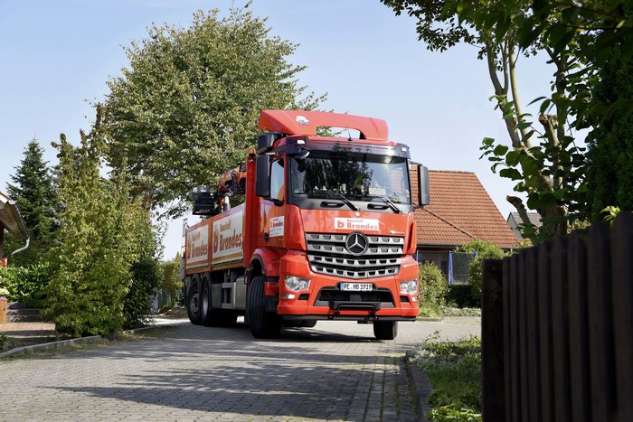 Red Mercedes-Benz truck with Brandes logo