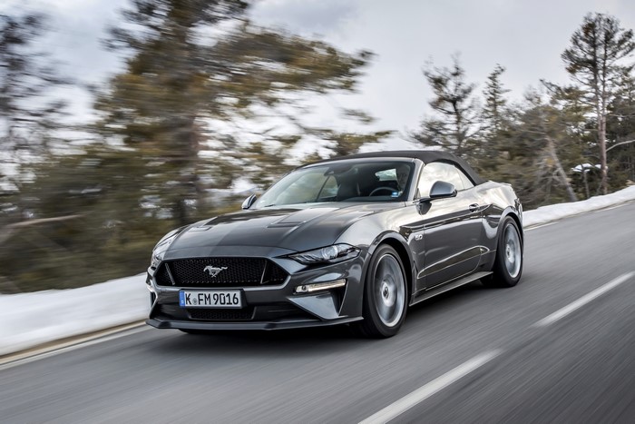 2018 Ford Mustang GT 5.0 Convertible driving on a snowy road