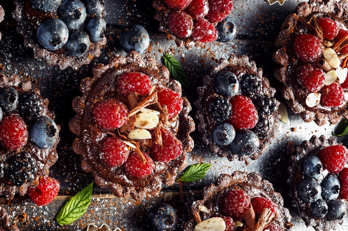 Chocolate tarts with raspberries and blueberries