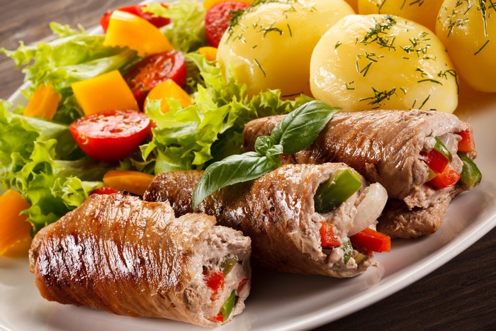 Meat rolls with potatoes and salad