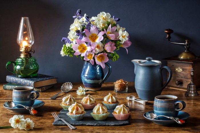 Still-life with flowers, cakes, and coffee