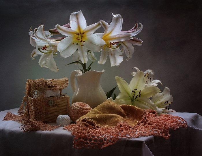 Still-life with white lilies and decorative items