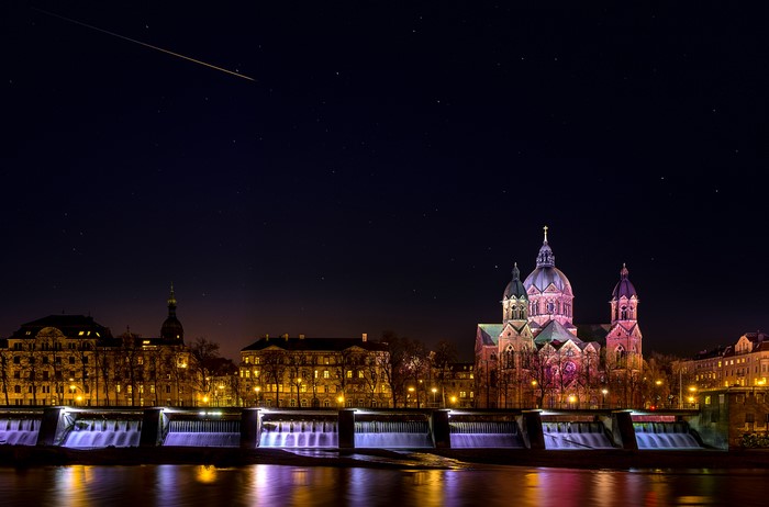 Munich skyline with St. John's Church at night