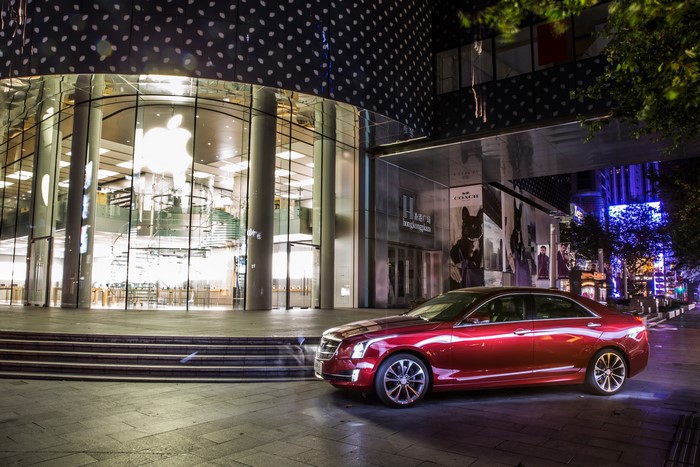 Red 2015 Cadillac ATS-L parked outside Apple Store