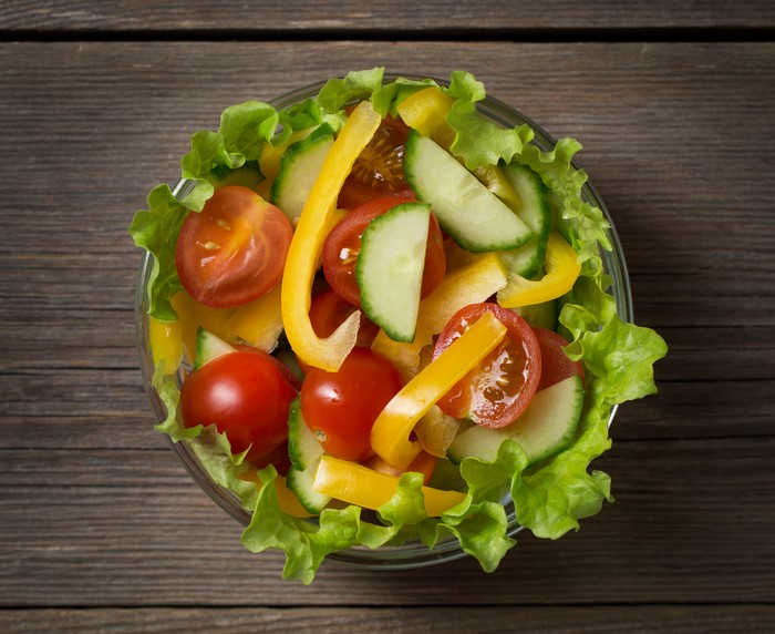 Salad with tomatoes, cucumbers, and bell peppers