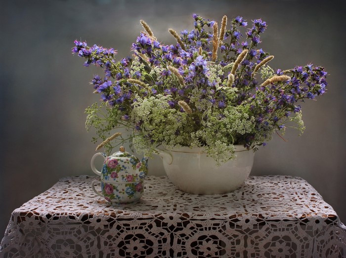 Still-life with wildflowers and a teapot
