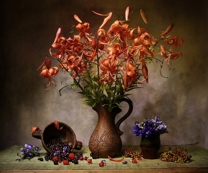 Still life with lilies and berries