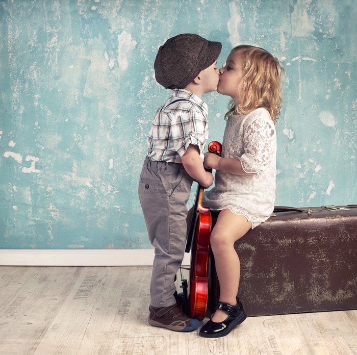 Boy and Girl Kissing with Violin