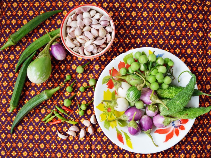 Vegetables and garlic on a patterned cloth