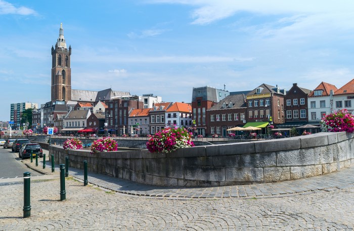 Roermond Netherlands canal with church and houses