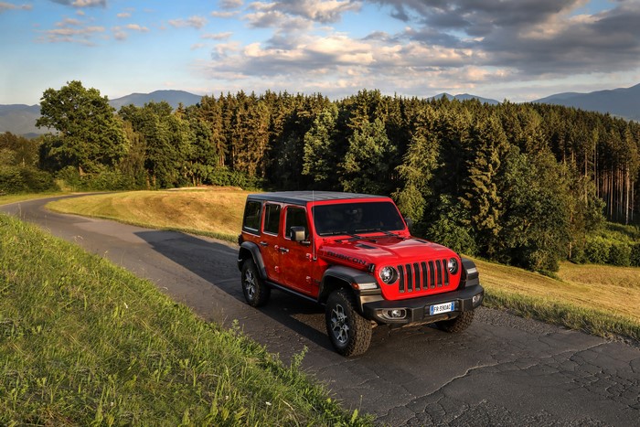 4K Red Jeep Wrangler Rubicon on Country Road