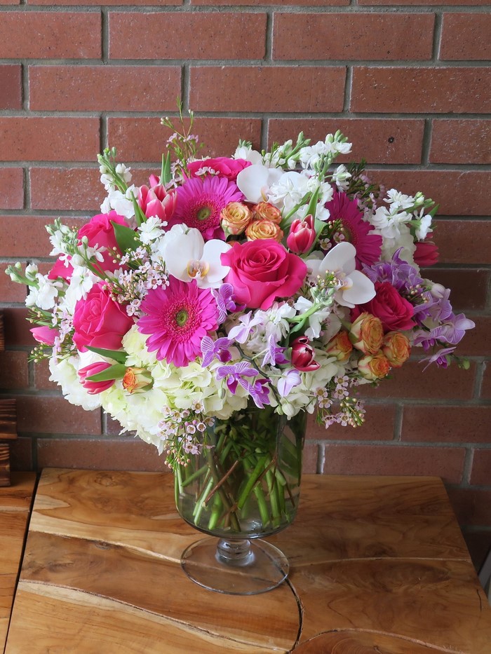 Pink and White Flower Arrangement in Glass Vase