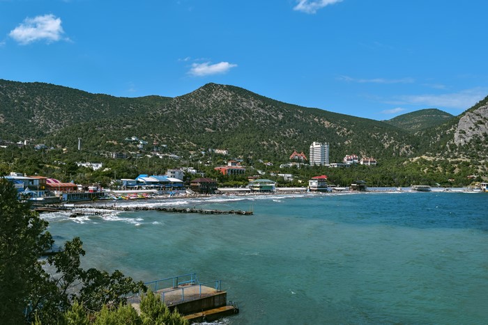 Coastal town with mountains and bay in Crimea