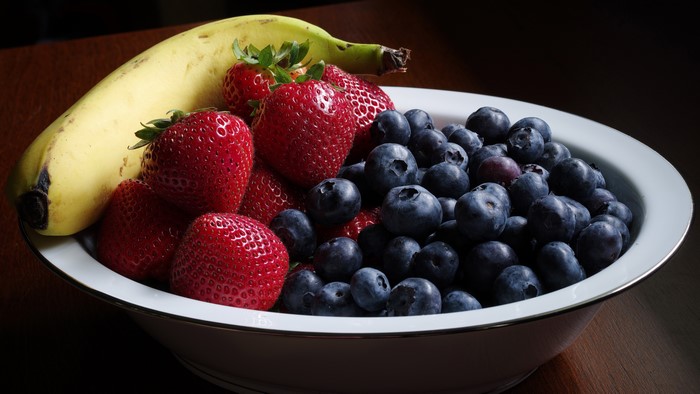 Banana, Strawberries, and Blueberries in a Bowl
