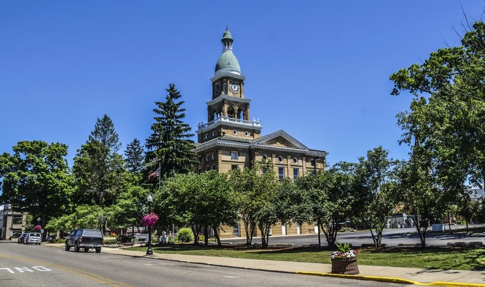 Courthouse with clock tower and trees in Hillsdale, Michigan