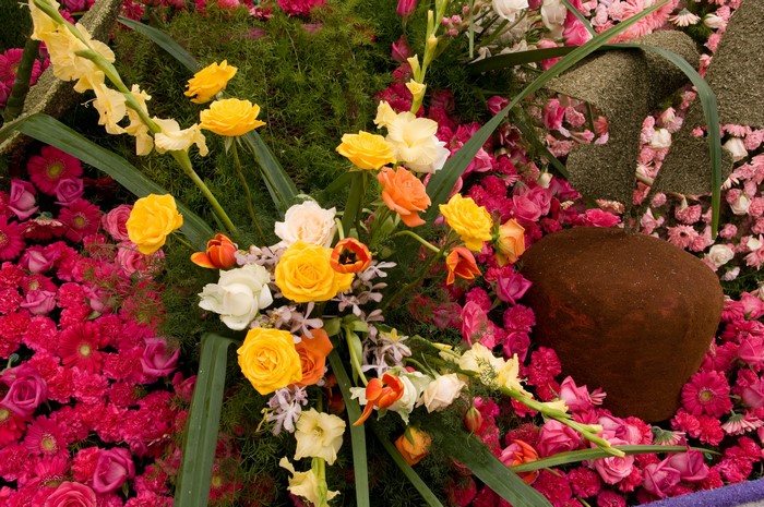 Floral arrangement with roses, tulips, and gladiolus