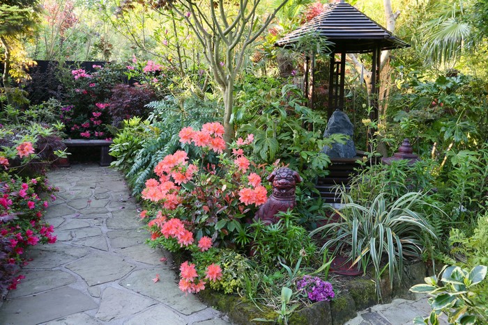 Garden with Rhododendrons, Sculptures, and Gazebo in England