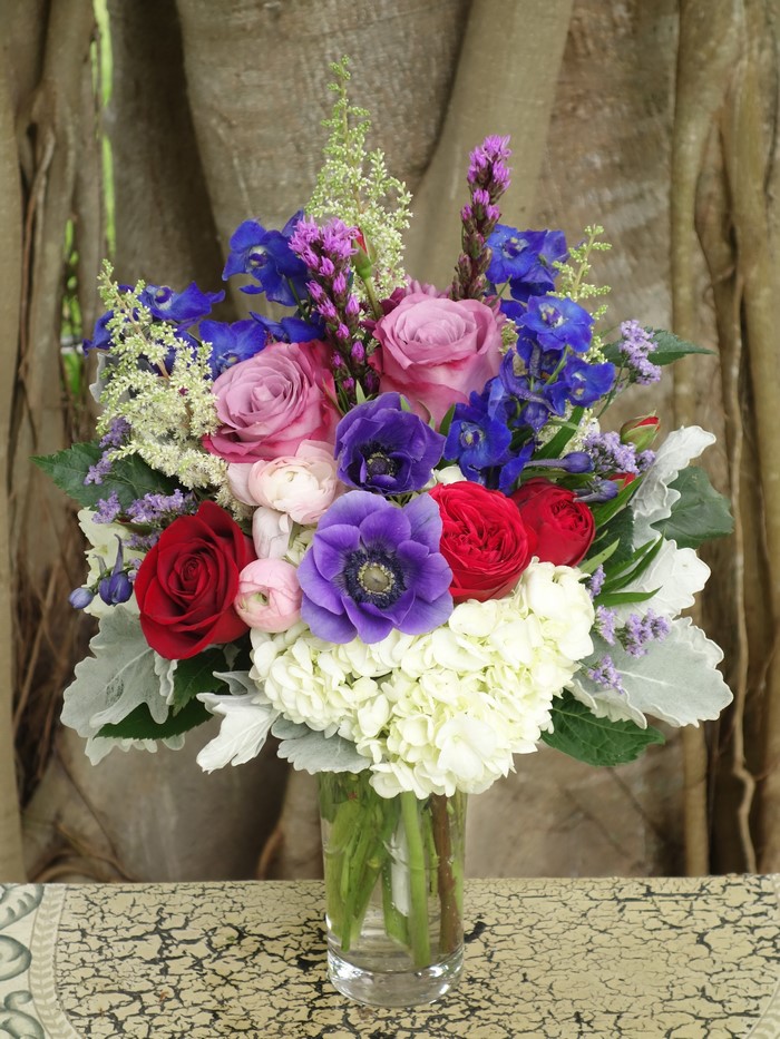 Floral arrangement with roses, anemones, and hydrangeas