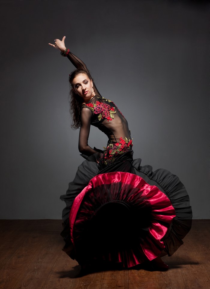 Flamenco dancer in a black and red dress