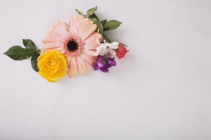 Pink Gerbera, Yellow Rose, and Small Flowers
