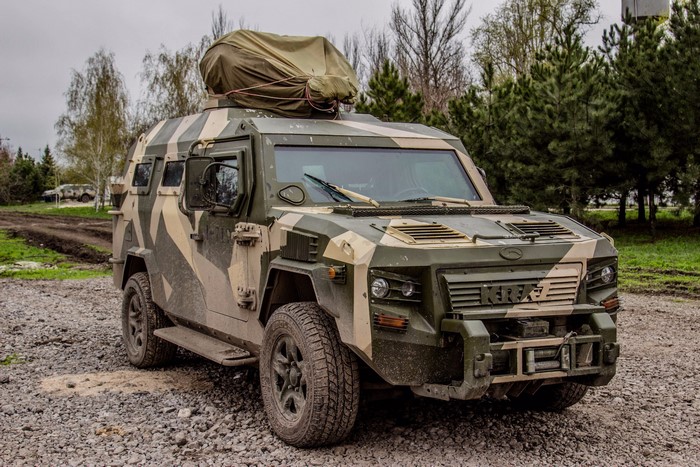 KRAZ KrUGUAR armored vehicle with camouflage