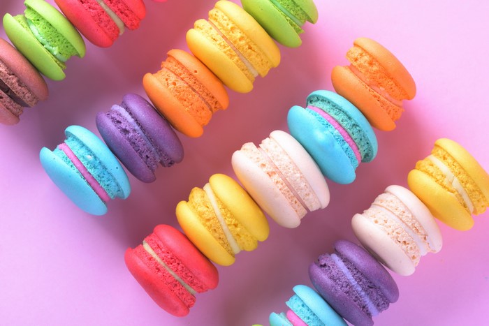 Multicolor Macarons on Pink Background