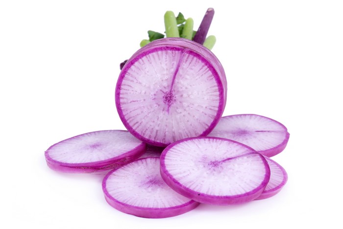 Sliced Radishes on White Background