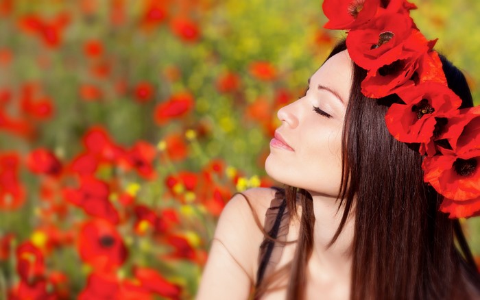 Woman with Poppy Wreath in Field