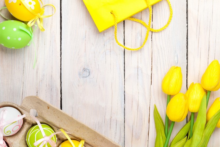 Easter Tulips and Eggs on Wooden Background