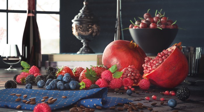 Still-life with berries, pomegranate, and wine